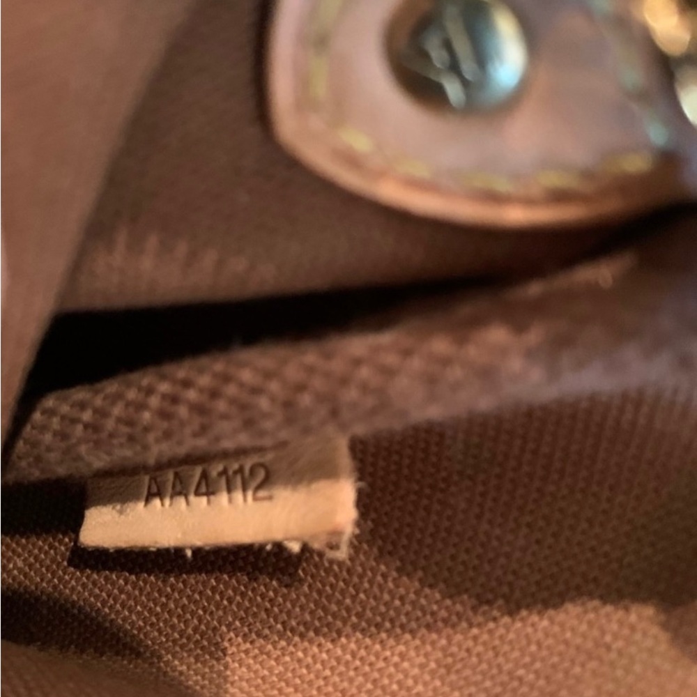 Authentic Louis Vuitton eva.with automatic monogram strap - Picture 10 of 10